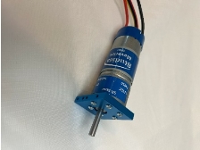 A blue and silver electric motor with black wires

Description automatically generated